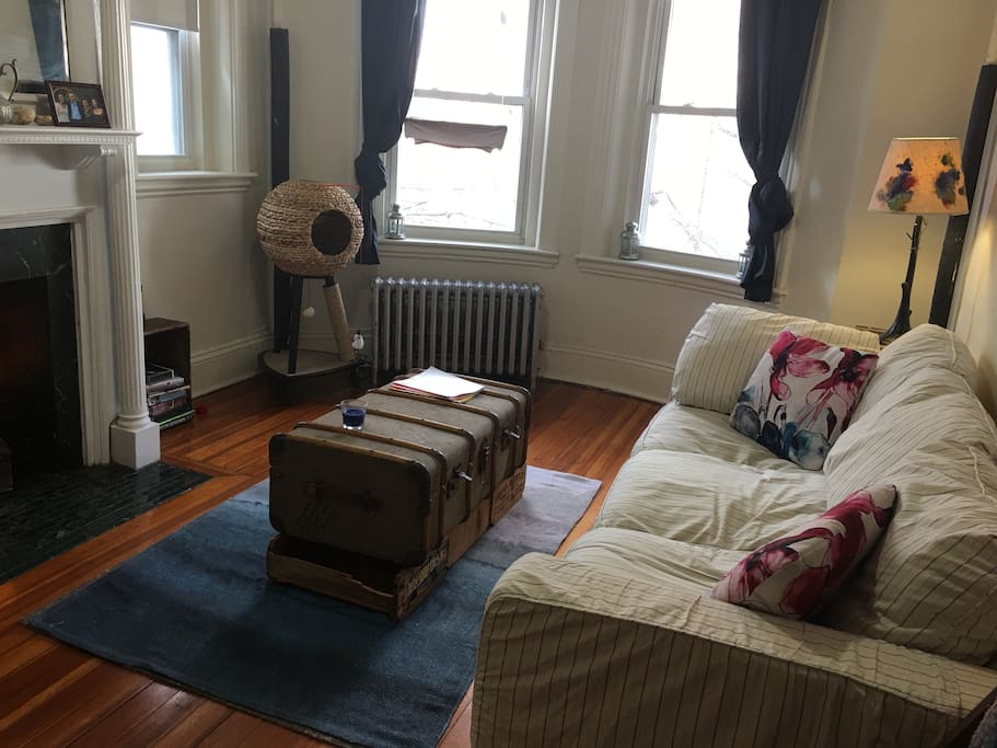 Spacious living room with bay windows