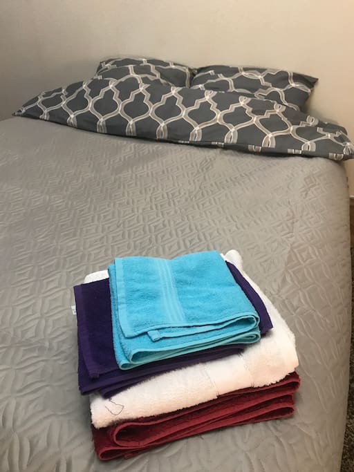 Washed towels and fresh bed sheets