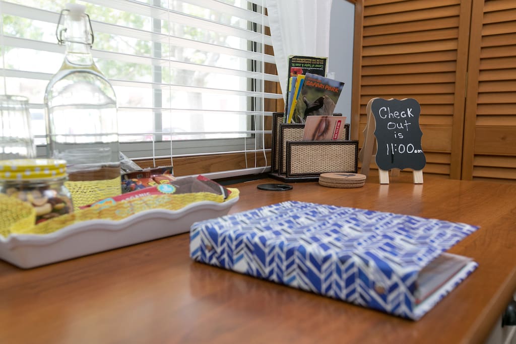 The room also has a desk for guests that may need a space for work or school.