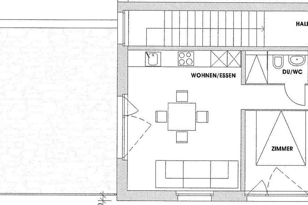 Grundriss Ferienwohnung mit Terrasse und Treppenhaus