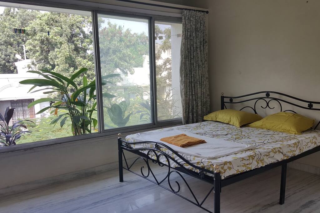 Large window with outside flower garden