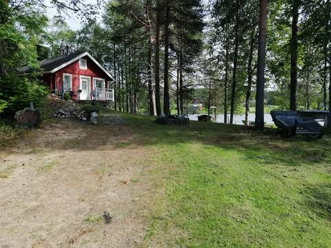Red cottage by the lake