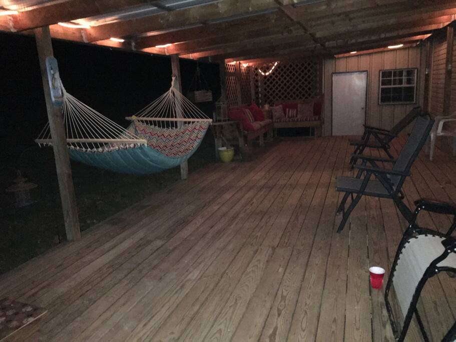 Back porch with outside gas grill, propane fish fryers, electric smoker