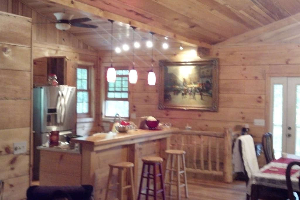 Kitchen counter and stairs to fir pit in patio.