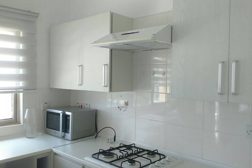 Kitchen (fridge, stove, washing machine, kitchen utensils). Кухня (холодильник, плита, стиральная машина, посуда).