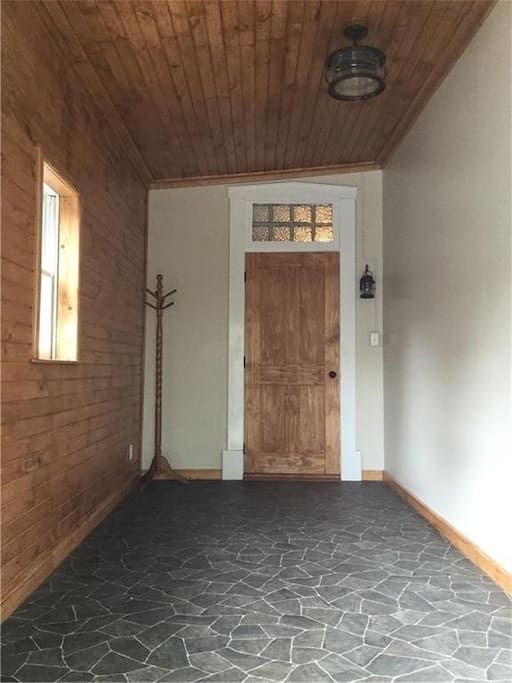 Photo from the front door of the mudroom & foyer.