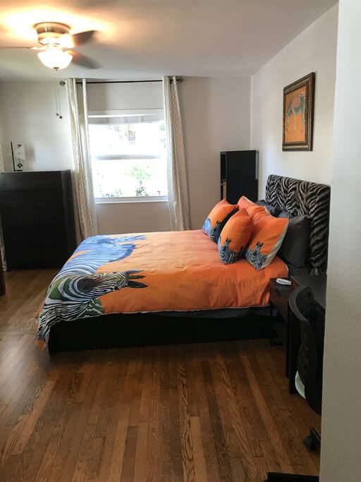 As you walk into the bedroom, you'll see the queen size, sleep number bed which you can adjust for your comfort.