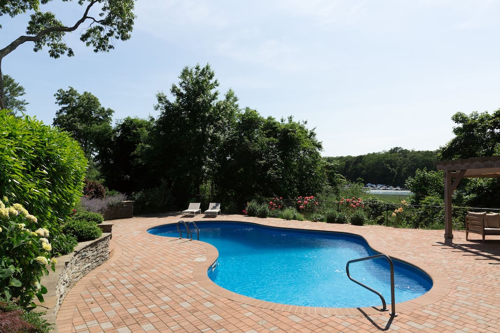 heater salt water pool overlooking water views with boats passing through