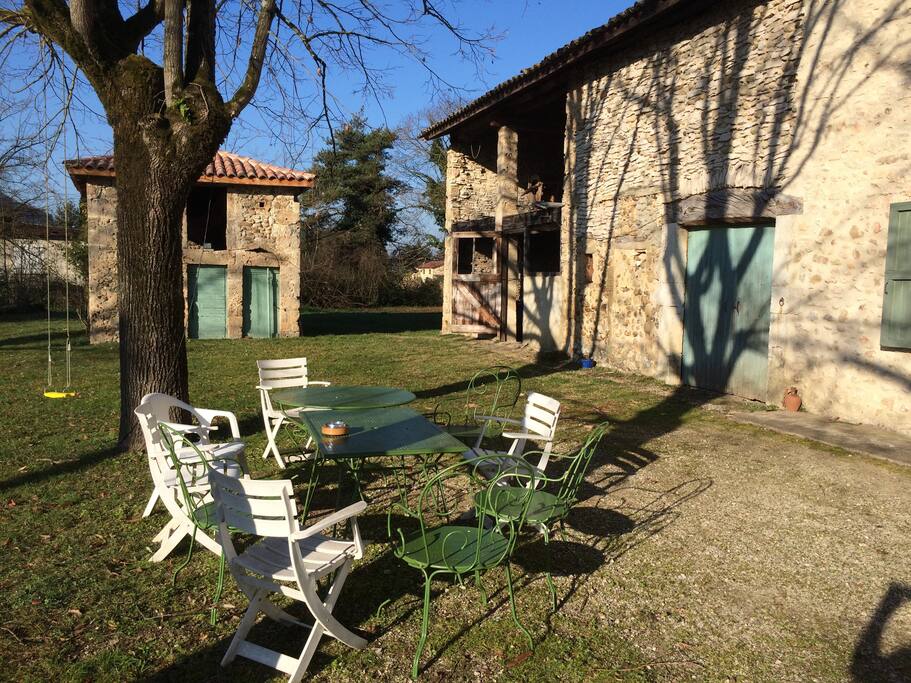 Garden, table, chairs and BBQ.