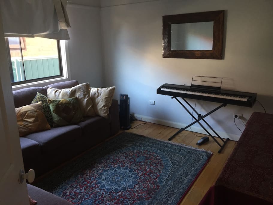 Living room with L shaped couch for extra visitors