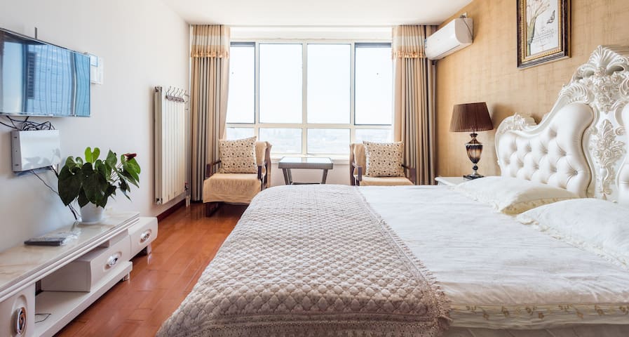 青岛YiRan温馨海景公寓-万达店