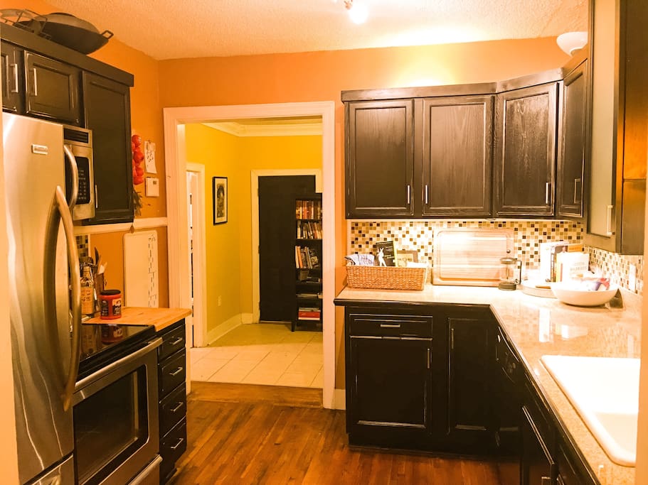 Cute kitchen looking from the dining room into the mud room!!