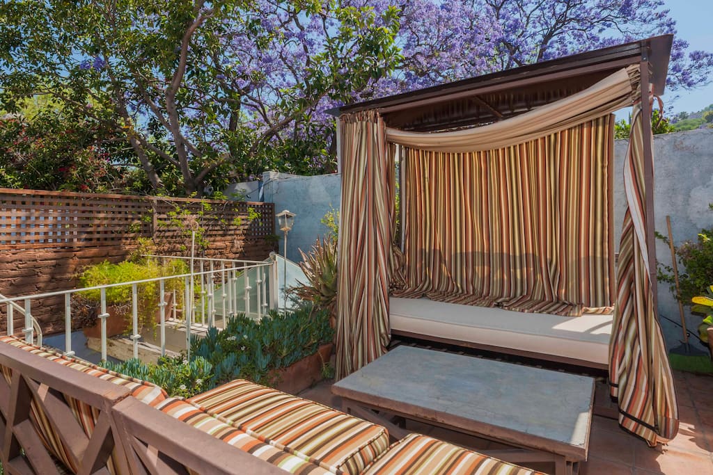 Rooftop terrace..with canopy bed to sit and enjoy the sunset or sleep under the stars.