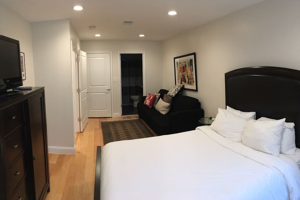 Master bedroom suite with attached private bathroom