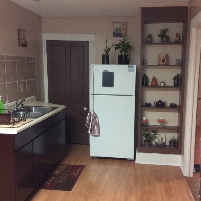 Kitchen, coffee, tea and hot cocoa provided with all the fixings.