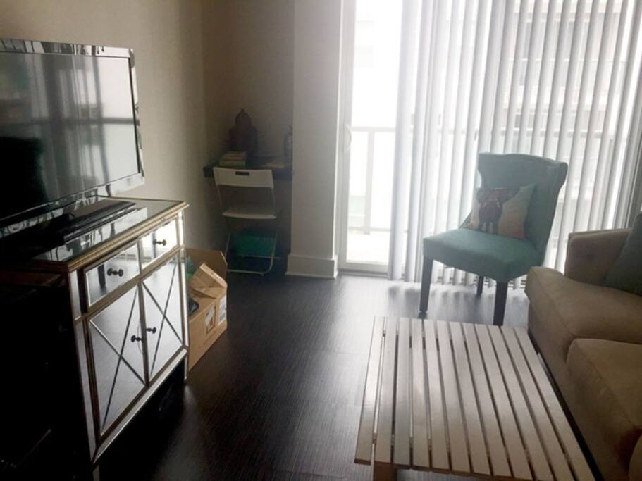The living space opens to the patio, which overlooks the Terminus community and has visibility to Piedmont Avenue.