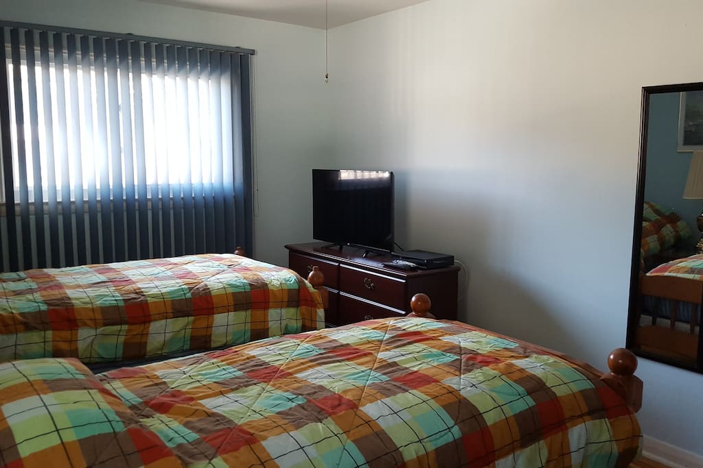 room with two beds tv and wi:fi