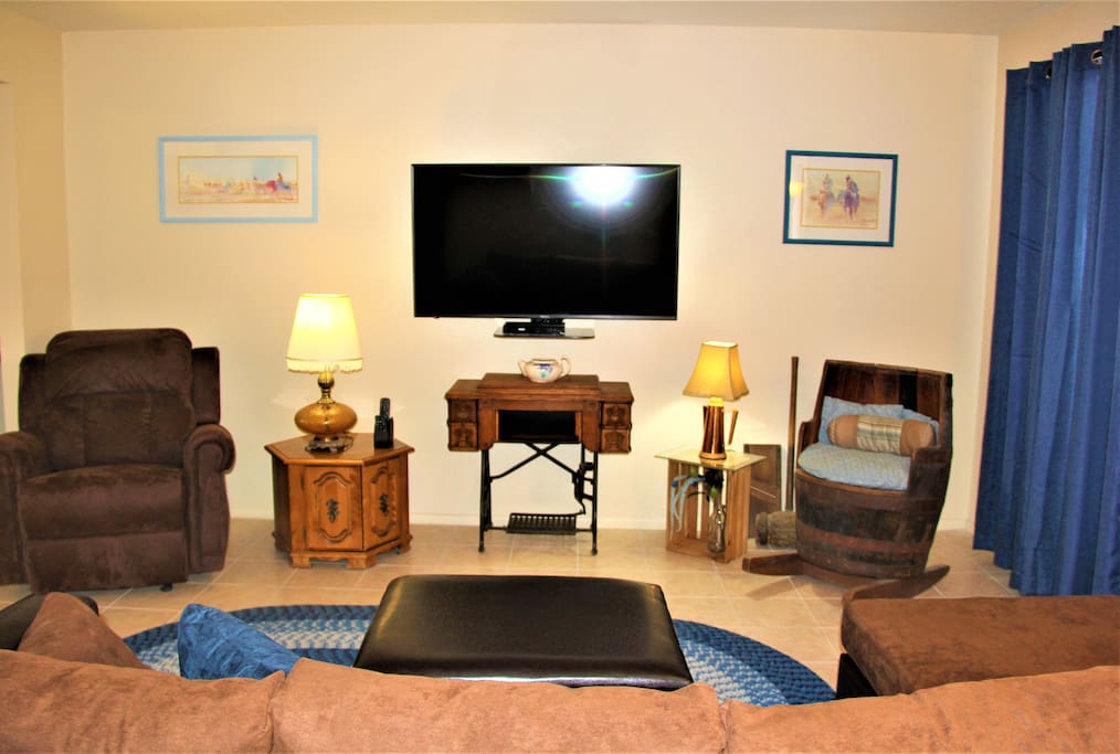 Antiques and Artwork Mixed with Modern Comfort, Huge TV