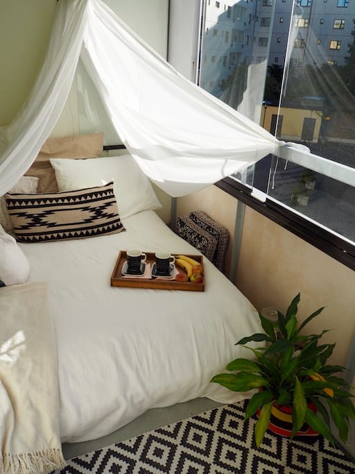 Our balcony. It's also possible to sleep there! (the bed is not full-size though)