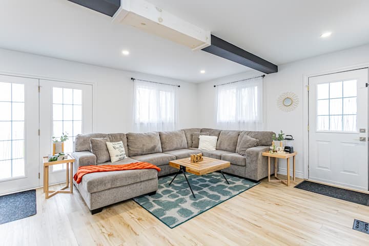 Large comfortable sectional seating 

Throw blankets to cozy up with while watching a movie while you lounge with family and friends
Puzzles, Board games, Yoga Mats