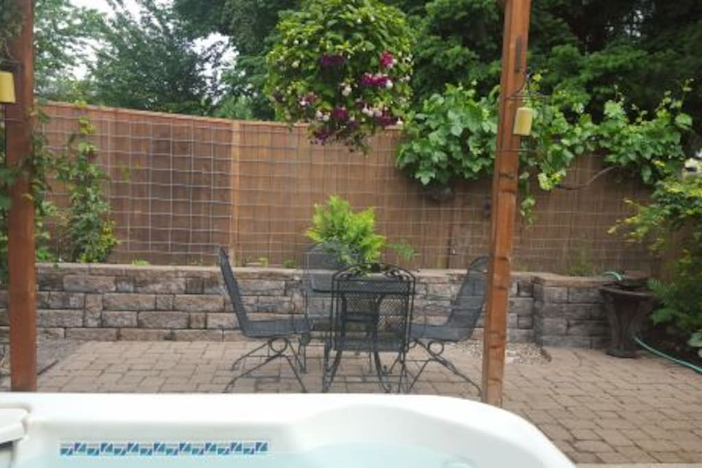Three-man hot tub, small private patio in back.