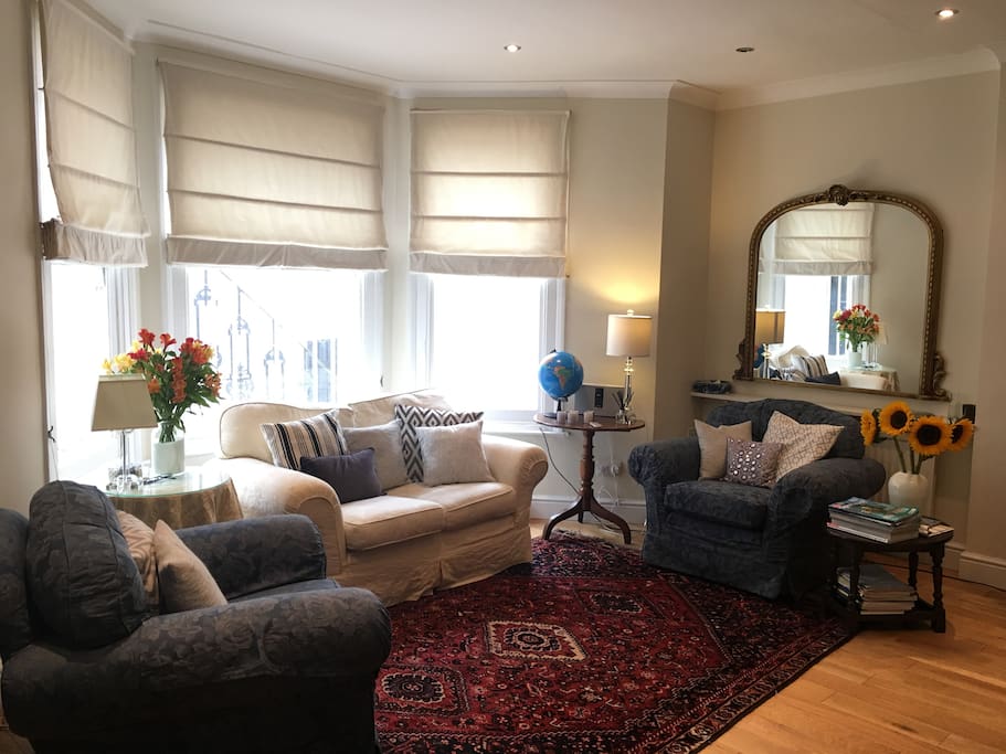 Living room is bright and open to the kitchen. Free WiFi in all rooms.