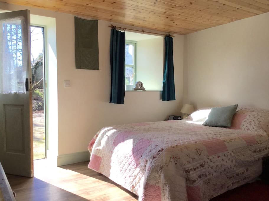 Ground floor access to a spacious bedroom with double & single beds