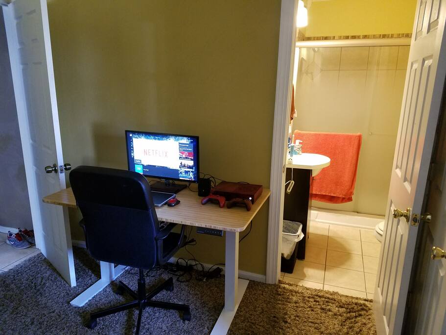 Private bathroom with tile floor