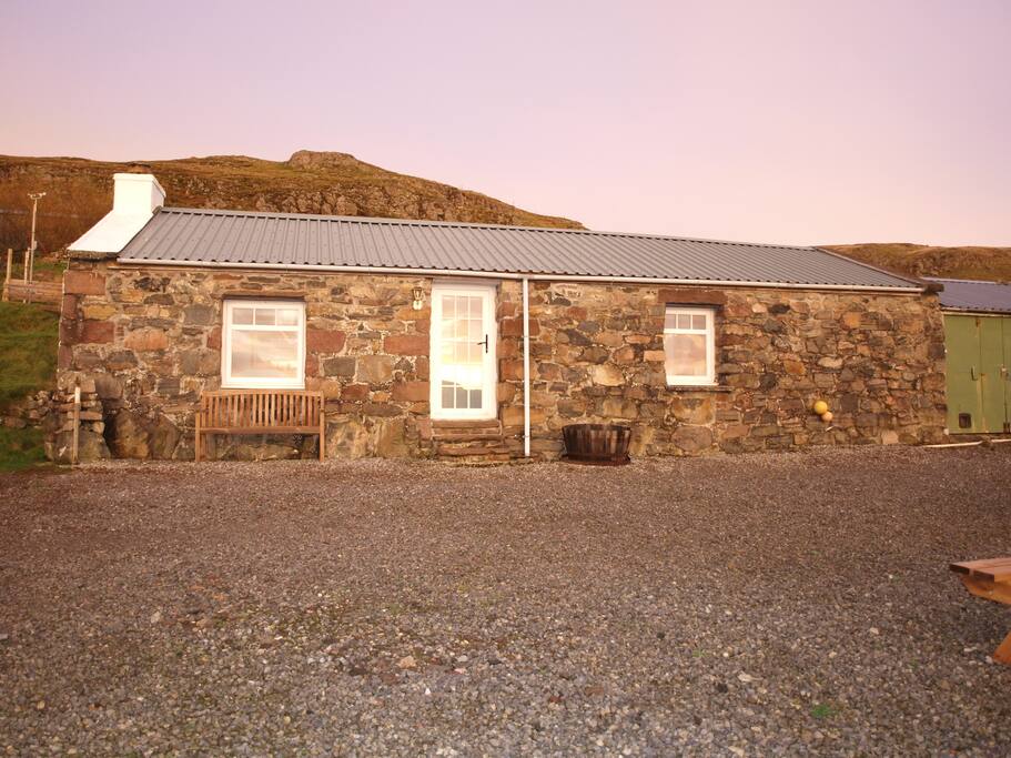 The Bothy reflecting a winter sunrise