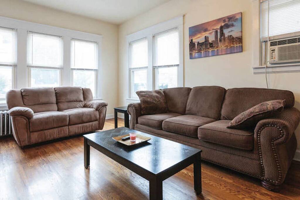 Living Room area where TV is located. Apple TV is provided so you can stream your favorite TV Shows and Movies