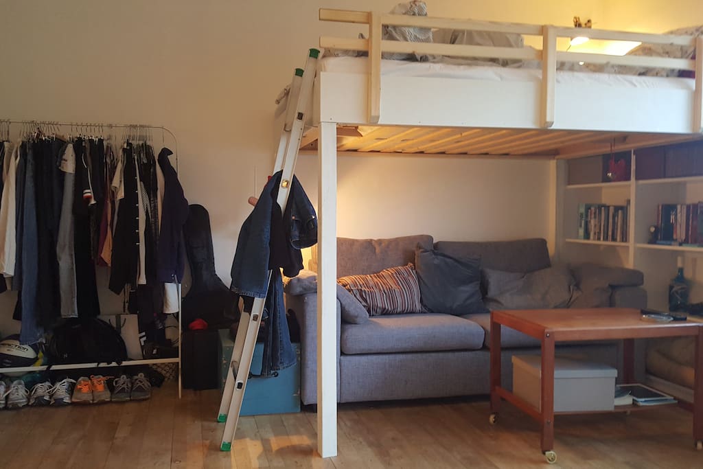 Coucharea, bed and wardrobe.