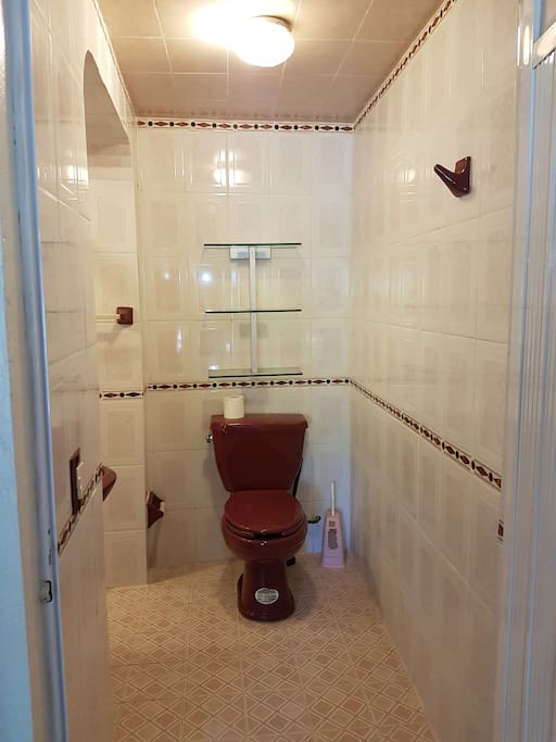 Recently retiled enlarged bath in the Garden Suite.