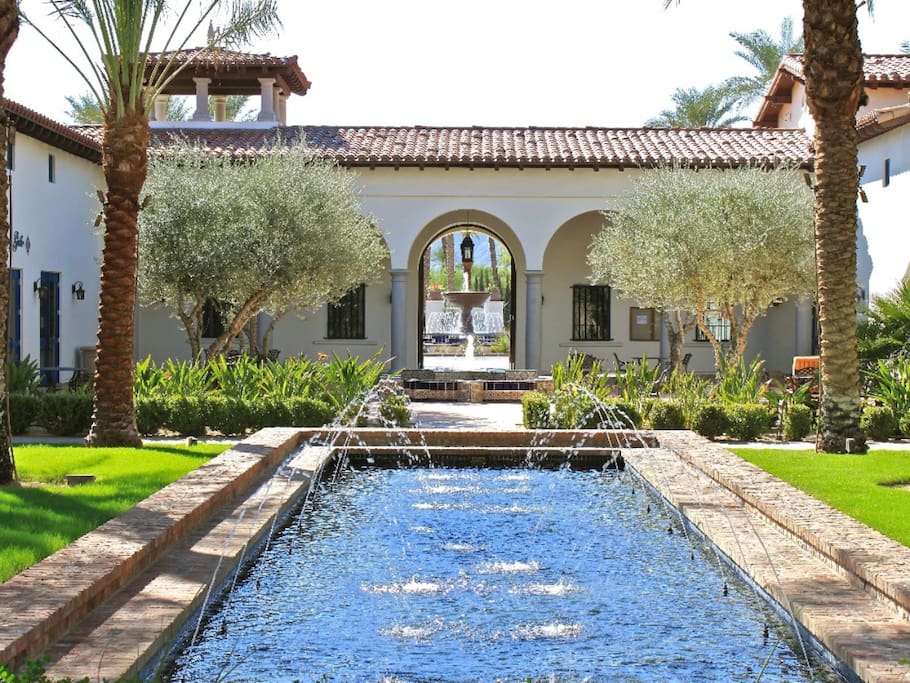 Common area. Well manicured landscaped walkways with fountains, outdoor fireplaces, and hammocks.