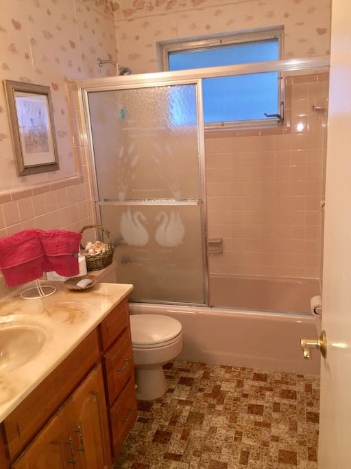 Shared bathroom with tub and shower!