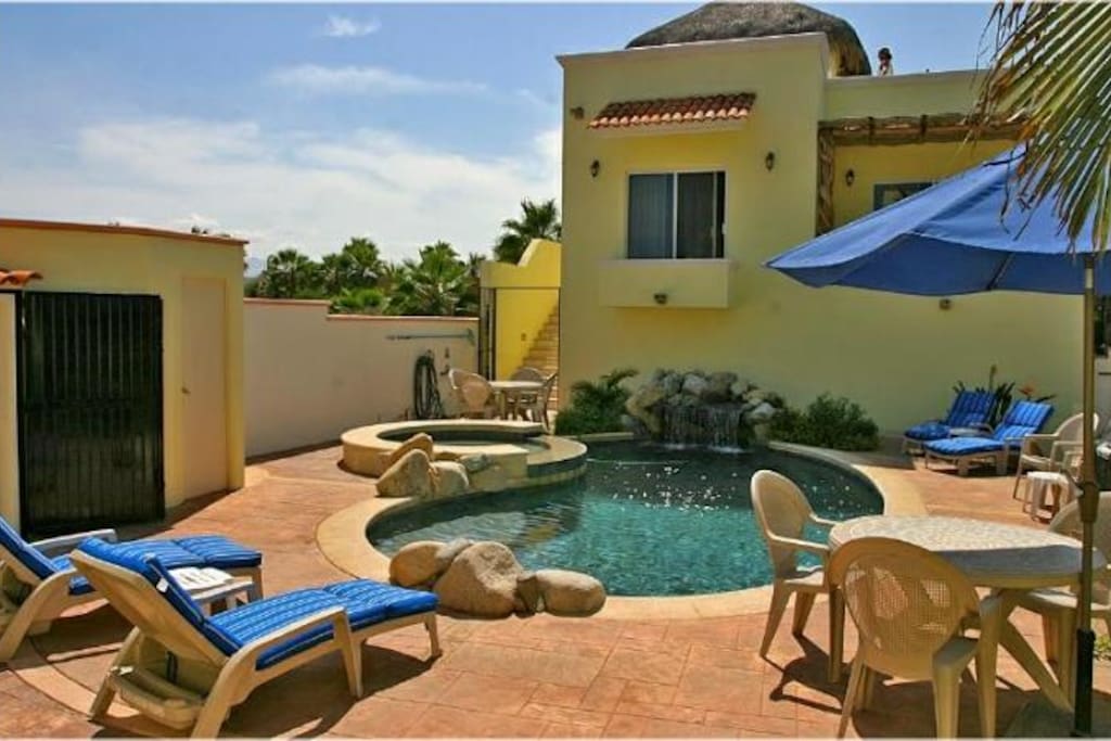 Your heated swimming pool, Jacuzzi, and waterfall!