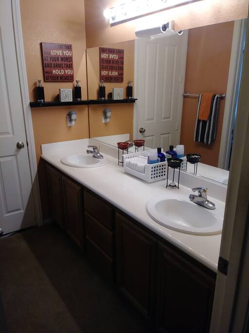 Private bathroom with dual sinks