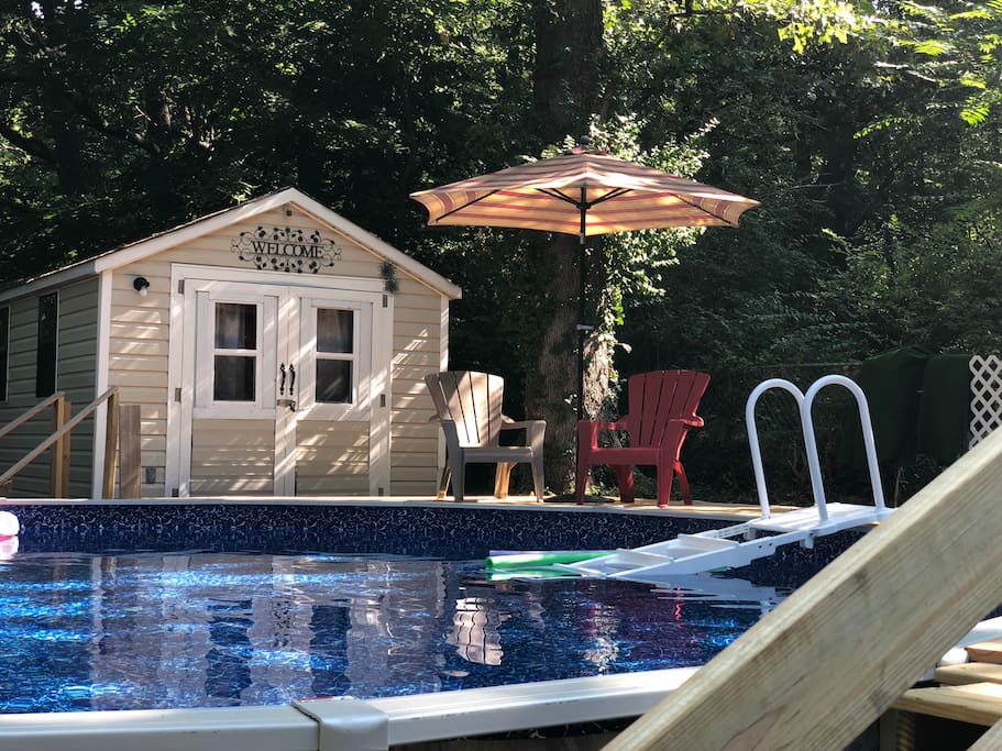 Tiny house with access to the home’s Above ground 24’ pool.
