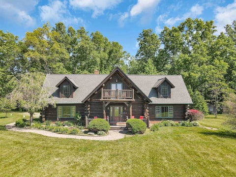 Enchanted log cabin with lake view