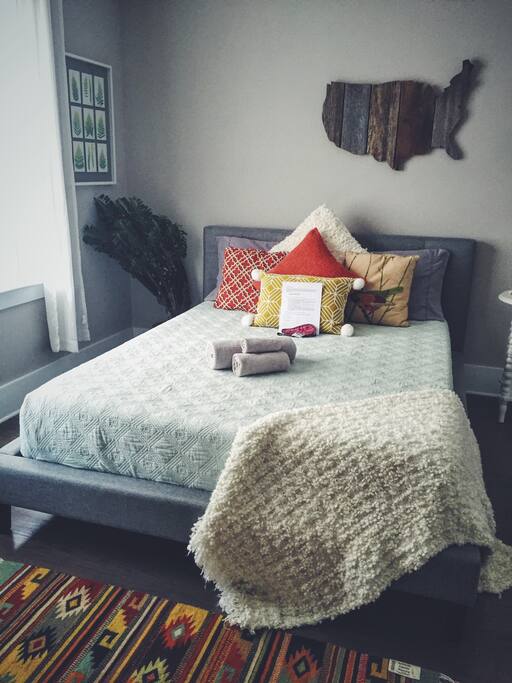 Comfortable bed with fresh towels.