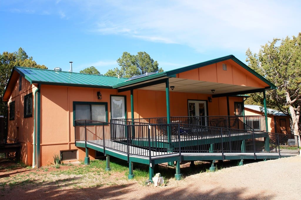 A large covered deck offers a great view of the mountains and a wheelchair ramp to an accessible private room.