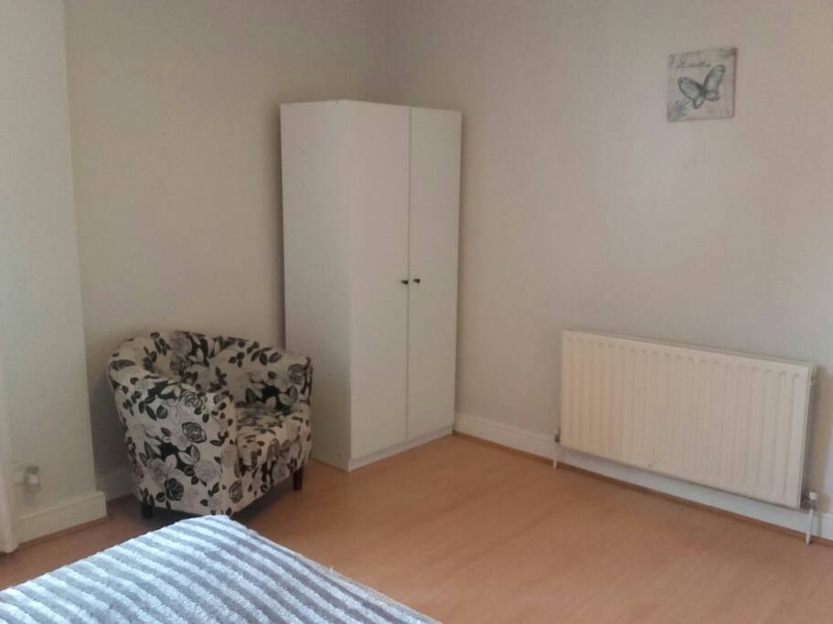 Bedroom storage and sitting area