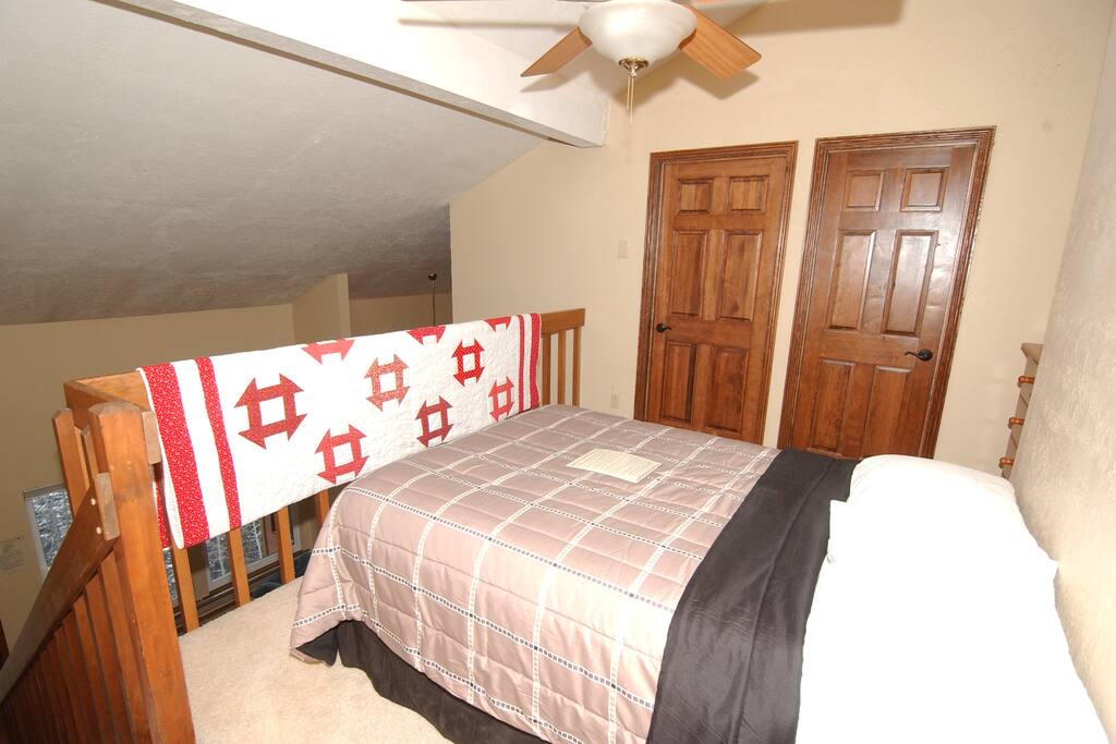 2nd area included with this booking has a double bed and is open to the area below.