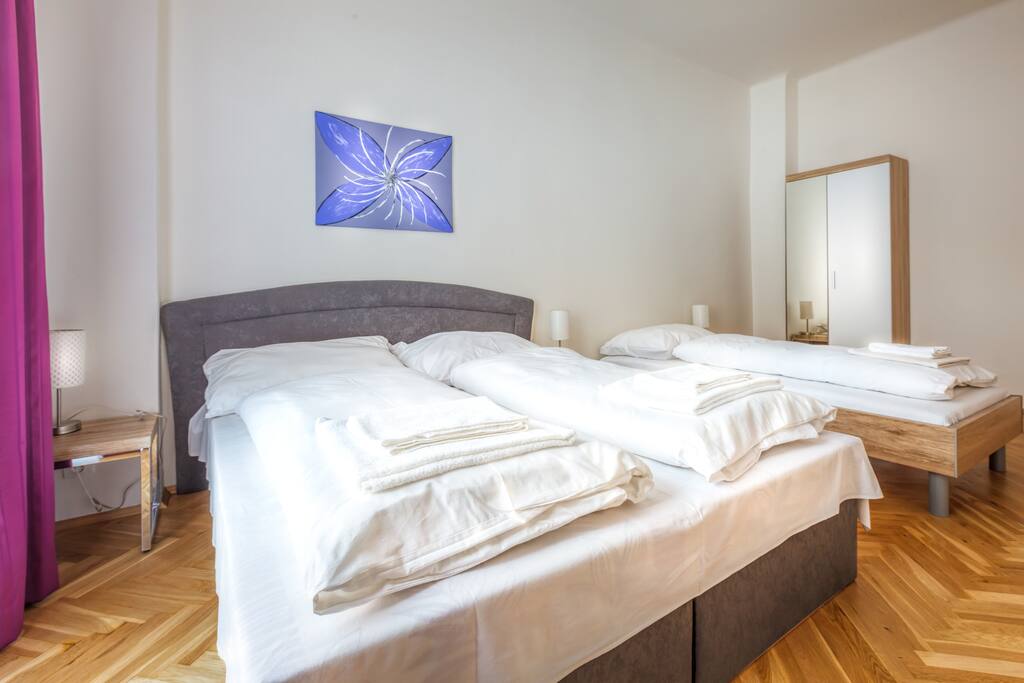 Bedroom №2: with king size bed for two person and 1 bed for one person.