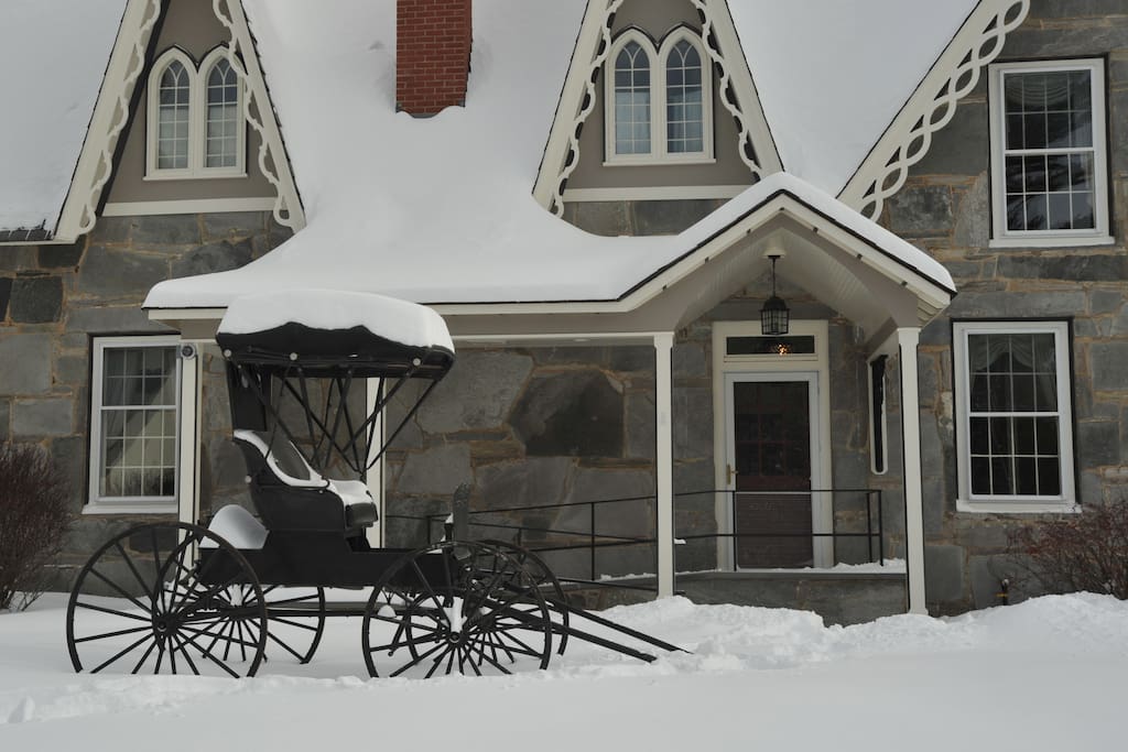 Our lovely carriage representing the original era of the house