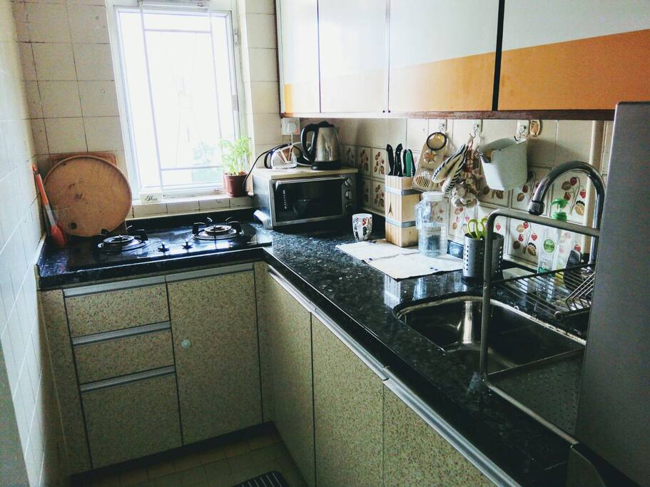 Kitchen with oven and gaz cooking station