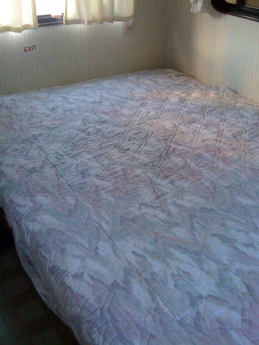 main cabin is a queen bed with some privacy
