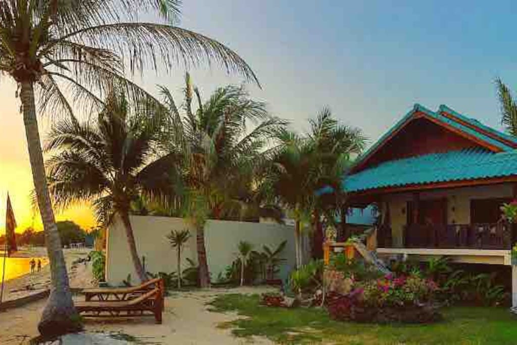 Front villa and beach at sunset