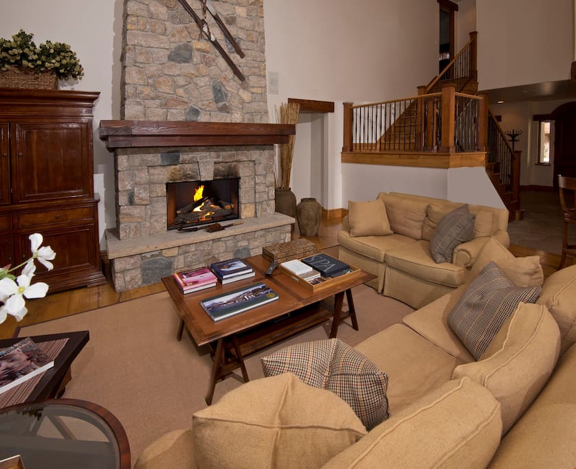 Warm up by the fireplace or entertain at the dining table.