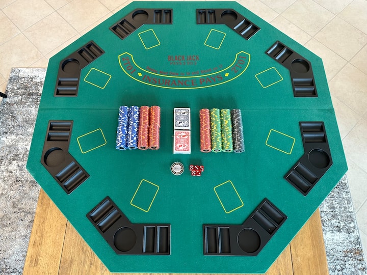 Poker table top folds in half. High quality casino-style poker chips