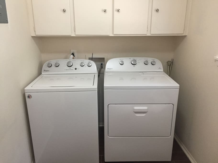 Washer and dryer for guest convenience.